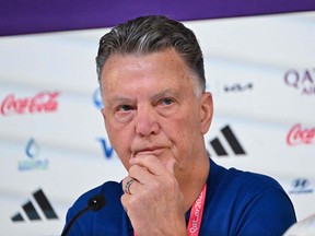 Netherlands coach Louis Van Gaal addresses a news conference at the Qatar National Convention Center.