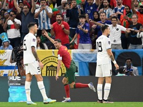 Portugal forward Cristiano Ronaldo celebrates after a goal against Uruguay.