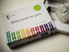 This illustration picture shows a saliva collection kit for DNA testing with 23andme.