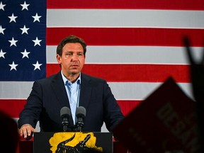 Florida Gov. Ron DeSantis speaks during a "Unite and Win" event as he campaigns for re-electionon the eve of the U.S. midterm elections, at Hialeah Park Clubhouse, in Hialeah, Fla., on Nov. 7, 2022.