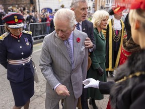 King Charles reacts after an egg was thrown in his direction during a ceremony at Micklegate Bar in York, northern England on Nov. 9, 2022 as part of a two-day tour of Yorkshire.