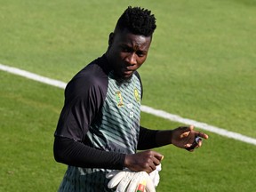 Cameroon's goalkeeper Andre Onana takes part in a training session at the Al Sailiya SC Training Site in Doha on November 27, 2022, on the eve of the Qatar 2022 World Cup football match between Cameroon and Serbia.