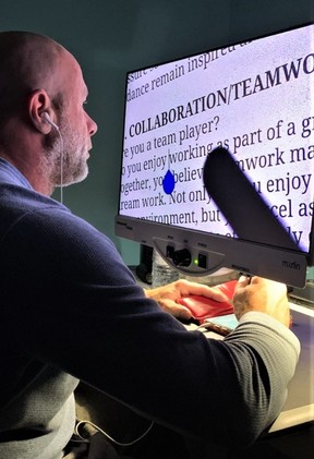 Chris Delaney working with some of the programs he utilizes for his writing