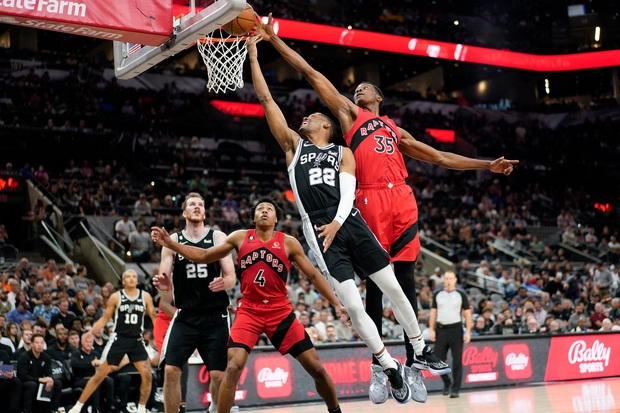 Raptors roll to easy win over Spurs as Porter makes debut