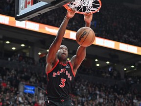 Toronto Raptors forward OG Anunoby (3) dunks for a basket against the Houston Rockets in the second half at Scotiabank Arena.