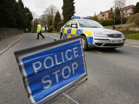 The Police Service of Northern Ireland closes a road in County Down, Northern Ireland.