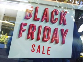 A Black Friday sale sign is seen at a shopping mall in San Diego, Wednesday, No.r, 23, 2022.
