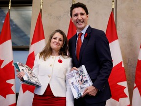 Canada's Deputy Prime Minister and Minister of Finance Chrystia Freeland and Canada's Prime Minister Justin Trudeau stop for a photo before delivering the fall economic statement on Parliament Hill in Ottawa, Ontario, Canada on Thursday, Nov. 3, 2022.
