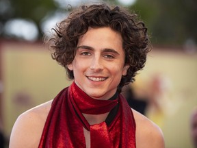 Timothee Chalamet poses for photographers upon arrival at the premiere of the film 'Bones and All' during the 79th edition of the Venice Film Festival on Sept. 2, 2022.