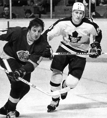 Toronto Maple Leaf defenceman Borje Salming (21) and L.A. King Pete Stemkowski (11) in action on Monday, March 27, 1978. THE CANADIAN PRESS/Bill Becker