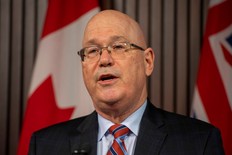 Minister of Municipal Affairs and Housing Steve Clark makes an announcement in the Ontario Legislature, in Toronto, Monday, Dec. 7, 2020.