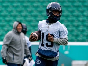Argonauts wide receiver Kurleigh Gittens Jr. runs with the football during a Grey Cup practice at Mosaic Stadium in Regina. The Argos have grown up and become stronger as a team after surviving some internal turmoil that could have derailed their season early on.