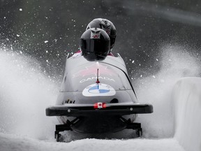Canada's Bianca Ribi, of Calgary, Alta., and Niamh Haughey, of Whitby, Ont., race to a fifth-place finish during the two-woman bobsleigh competition at the IBSF BOB world cup event, in Whistler, B.C., on Saturday, Nov. 26, 2022.