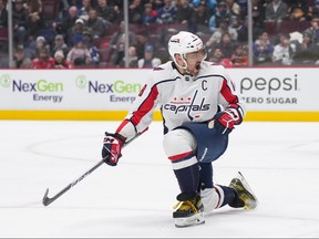 Ovechkin leads Gretzky for most road goals as Caps beat Canucks 2 Washington Capitals' Alex Ovechkin celebrates his first goal against the Vancouver Canucks in the first period of an NHL hockey game in Vancouver on Tuesday, Nov. 29, 2022.
