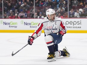 Washington Capitals' Alex Ovechkin celebrates his first goal against the Vancouver Canucks during the first period of an NHL hockey game in Vancouver, on Tuesday, November 29, 2022.