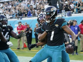 Jacksonville Jaguars wide receiver Zay Jones (7) celebrates a two-point conversion catch with his team during the second half of an NFL football game against the Baltimore Ravens, Sunday, Nov. 27, 2022, in Jacksonville, Fla.