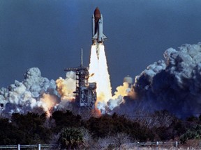U.S. space shuttle Challenger lifts off from a launch pad at Kennedy Space Center in Cape Canaveral, Fla., Jan. 28, 1986, 72 seconds before its explosion killed the crew of seven.