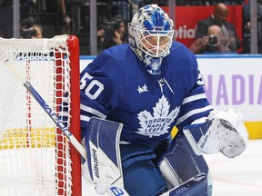 Erik Kallgren of the Toronto Maple Leafs protects the corner against the Boston Bruins during an NHL game at Scotiabank Arena on Nov. 5, 2022 in Toronto.