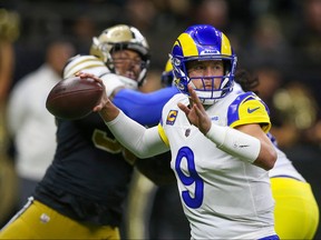 Nov 20, 2022; New Orleans, Louisiana, USA; Los Angeles Rams quarterback Matthew Stafford (9) makes a throw in the first quarter against the New Orleans Saints at the Caesars Superdome. Mandatory Credit: Chuck Cook-USA TODAY Sports