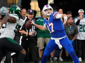 Buffalo Bills quarterback Josh Allen (17) tries a desperation heave on 4th and 21 Sumday against the Jets. It fell inclomplete to ice the game for the Jets at MetLife Stadium.