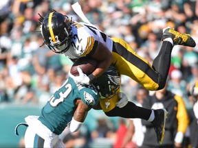 Oct 30, 2022; Philadelphia, Pennsylvania, USA; Pittsburgh Steelers running back Najee Harris (22) is tackled by Philadelphia Eagles safety C.J. Gardner-Johnson (23) during the third quarter at Lincoln Financial Field.