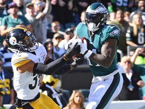 Oct 30, 2022; Philadelphia, Pennsylvania, USA; Philadelphia Eagles wide receiver A.J. Brown (11) catches touchdown pass against Pittsburgh Steelers safety Minkah Fitzpatrick (39) during the first quarter at Lincoln Financial Field.