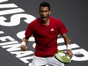 Canada's Felix Auger Aliassime reacts during the men's single final of the Davis Cup tennis tournament match between Canada and Australia at the Martin Carpena sports hall, in Malaga, Spain, Sunday, Nov. 27, 2022.