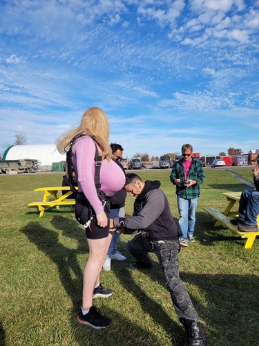 An image posted to social media by a user who identified the skydiver as the transgender teacher at an Oakville high school.