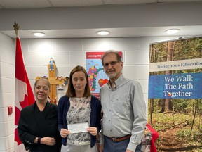 From left: Magda Khatib (mother of Zack), Valerie Cappuccitti (Principal of St. Christopher) and Hassan Noureddine (father of Zack Noureddine).