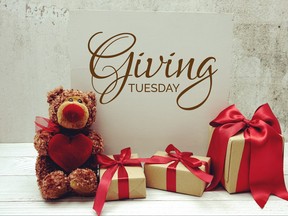 Giving Tuesday text message with teddy bear and gift boxes present