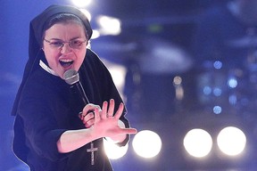 Sister Cristina Scuccia performs during the Italian State RAI TV show final “The Voice of Italy” in Milan on June 5, 2014. (MARCO BERTORELLO/AFP via Getty Images)