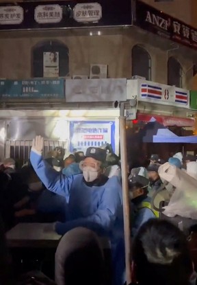 Protests against COVID-19 outbreak measures in Urumqi city, Xinjiang Uyghur, China in this screen grab obtained from a video released Nov. 25, 2022.