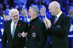 Former Toronto Maple Leafs players and members of the Hockey Hall of Fame, Darryl Sittler, left to right, Borje Salming and Mats Sundin take part in  a moving pregame ceremony prior to NHL hockey action between the Toronto Maple Leafs and Pittsburgh Penguins, in Toronto, Friday, Nov. 11, 2022. 