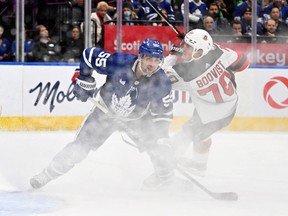 Maple Leafs' Mark Giordano tracks the play while covering New Jersey Devils' Jesper Boqvist in the second period at Scotiabank Arena on Thursday, Nov. 17, 2022.