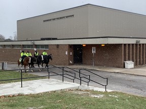 Mounted police officers are seen at Birchmount Park Collegiate Institute on Tuesday, Nov. 15, 2022, one day after a student was seriously injured following a stabbing inside the Scarborough school.