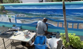 A street artist creates a beautiful image in Barbados. Rita DeMontis/Toronto Sun