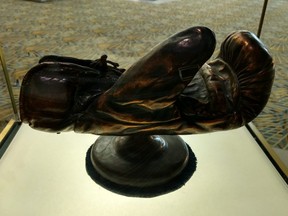 This bronzed glove was worn by Joe Louis in his 1938 win over Max Schmeling. It’s on display at Huntington Place in Detroit. DONALD DUENCH/TORONTO SUN
