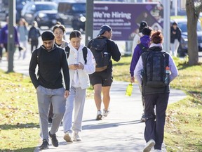 Students make their way to and from class at Western University in London on Tuesday, Nov. 8, 2022. Western faculty could be on strike as early as Monday, as contract talks over workload and job security go down to the wire this week. (Derek Ruttan/The London Free Press)