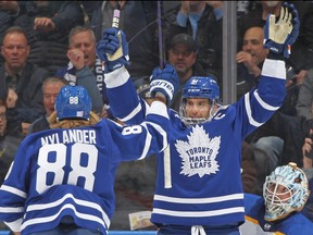 John Tavares #91 of the Toronto Maple Leafs celebrates a goal against the Buffalo Sabres.