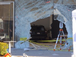 A view shows the site after a vehicle crashed into an Apple store in Hingham, Massachusetts, November 21, 2022.