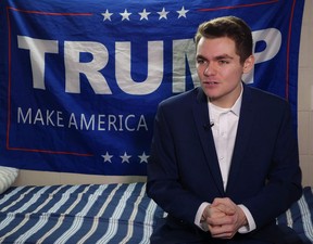 In this file photo taken on May 9, 2017, conservative student and supporter of Donald Trump, Nick Fuentes, answers question during an interview with Agence France-Presse in Boston, Mass.