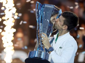 Novak Djokovic of Serbia poses with the trophy after defeating Casper Ruud of Norway during the Final on Day Eight of the Nitto ATP Finals at Pala Alpitour on Nov. 20, 2022 in Turin, Italy.