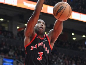 Raptors forward O.G. Anunoby throws down one of his six dunks against the Houston Rockets on Nov. 9 in Toronto.