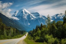 Scenic Yellowhead Highway in Mt. Robson Provincial Park with Mount Robson in the background.