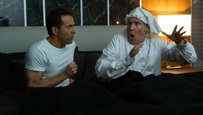 Ryan Reynolds and Will Ferrell in “Spirited,” now streaming on Apple TV+.