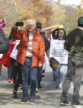 Thousands of demonstrators - concerned citizens, parents and union groups - showed up to Queen's Park and encircled the Legislature filling the front lawns. The group was there to protest the Ontario Conservative government's actions and supporting CUPE workers demands on Friday, Nov. 4, 2022.