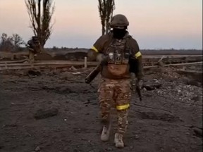 Ukrainian soldiers from the 28th brigade say that they advance towards Kherson in southeast of Posad-Pokrovske, Kherson Oblast, Ukraine, Nov. 10, 2022 in this screen grab obtained from a video.