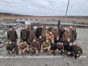 Ukrainian prisoners of war pose after a swap in Zaporizhzhia region, Ukraine November 24, 2022.