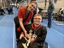 Eliana and Jacob McArthur at Volt World Cup in Sweden, with Team USA’s spaniel puppy mascot.