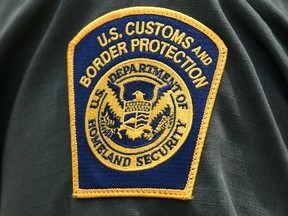 A U.S. Customs and Border Protection patch is seen on the arm of an agent in Mission, Texas, July 1, 2019.